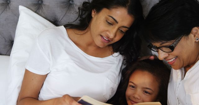 Mother and Grandmother Reading Bedtime Story - Download Free Stock Images Pikwizard.com