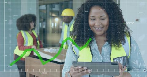 Engineer analyzing data with digital interface overlay