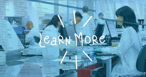 Researchers working at lab computers with learn more overlay for tech and data