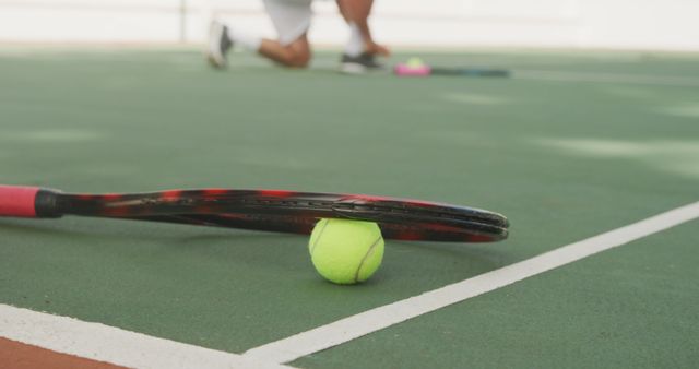 Tennis Racket and Ball on Court during Practice Session - Download Free Stock Images Pikwizard.com