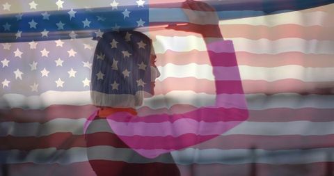 USA Flag Overlay on Female Surfer Symbolizing Patriotism
