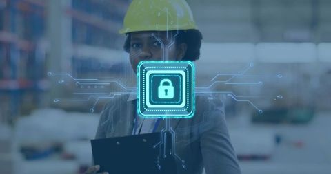 Supervisor inspecting warehouse implementing industrial cybersecurity and access control