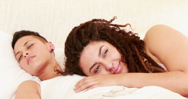 Happy couple relaxing together in bed - Download Free Stock Images Pikwizard.com