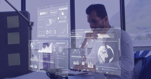 Businessman Analyzing Virtual Data Interfaces in Modern Office - Download Free Stock Images Pikwizard.com
