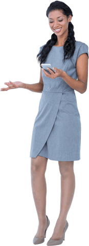 a businesswoman in a gray dress uses her smartphone, representing technology and communication. ideal for professional, tech-related, or corporate content showcasing modern work lifestyles in presentations, websites, and marketing materials.