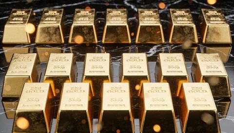 Stacked gold bars on black marble reflecting purity marks with warm bokeh lighting