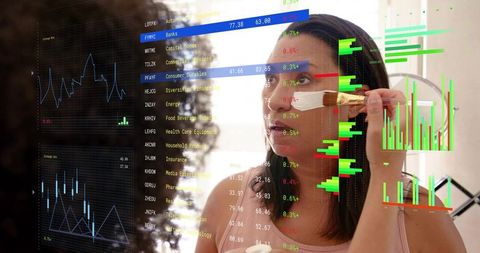 Applying makeup while checking financial market data on mirror, beauty and finance fusion