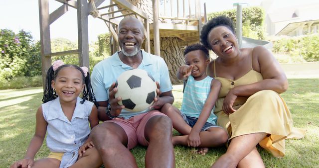 Happy Family Enjoying Outdoors with Soccer Ball - Download Free Stock Images Pikwizard.com