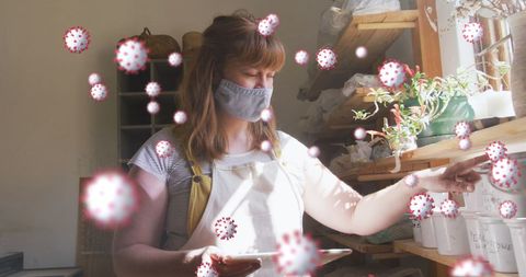 Woman Following Covid-19 Safety Protocols While Engaging in Gardening Hobby