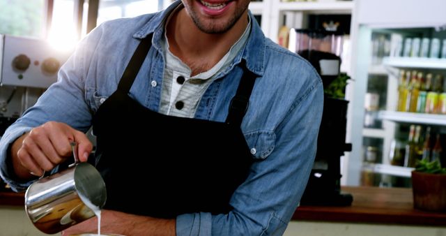 Young Barista Pouring Milk into Coffee in Cafe - Download Free Stock Images Pikwizard.com