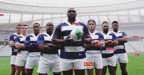 Rugby Team Standing United on Stadium Field Holding Ball
