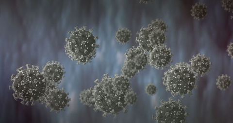 Microscopic View of Virus Cells Against Blurred Background