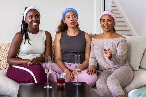 African american women enjoying cozy at-home spa night in loungewear and headbands