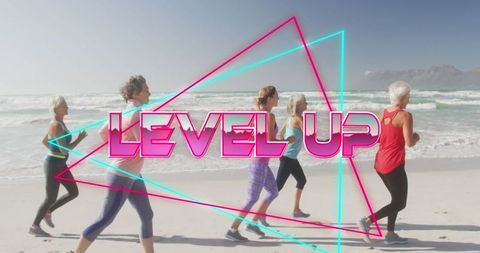 Group of Women Exercising Together on Beach
