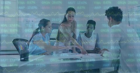 Diverse team discussing strategy with trading data overlay