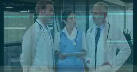 Medical Team Accessing Digital Patient Data in Modern Facility