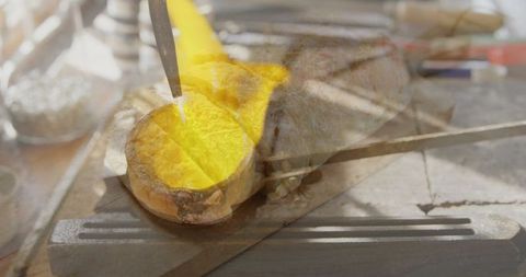 Artisan Molten Metal Pouring at Forge Workshop