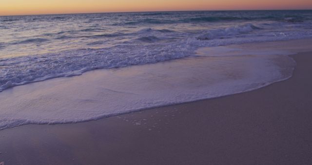 Gentle Waves on Beach at Sunset - Download Free Stock Images Pikwizard.com