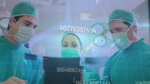Surgeons Discussing Medical Data with Digital Overlay