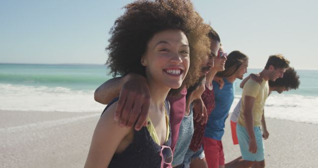 Group of Friends Walking on Beach and Smiling - Download Free Stock Images Pikwizard.com