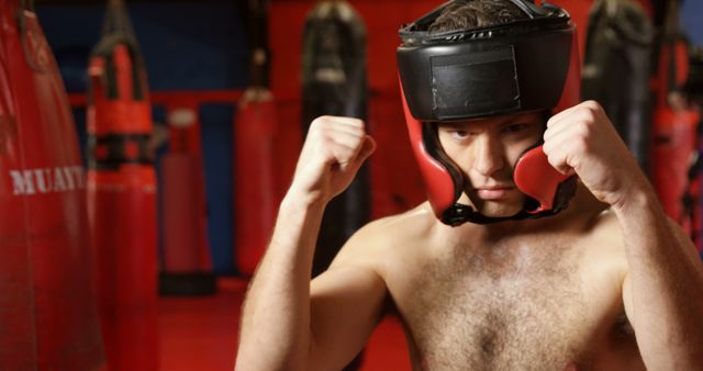 Red Muay Thai Gym Boxer Preparing for Fight - Download Free Stock Images Pikwizard.com