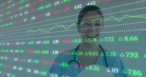 Nurse analyzing healthcare financial data in modern clinic