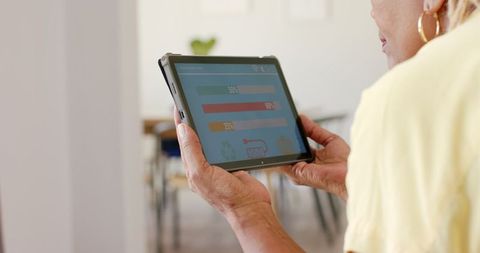 Senior Woman Checking Home Energy Use on Tablet - Download Free Stock Images Pikwizard.com