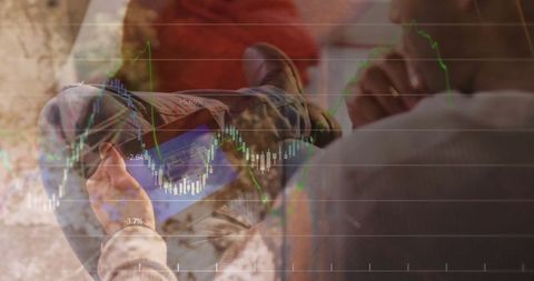 Man Analyzing Stock Market Trends at Home with Tablet