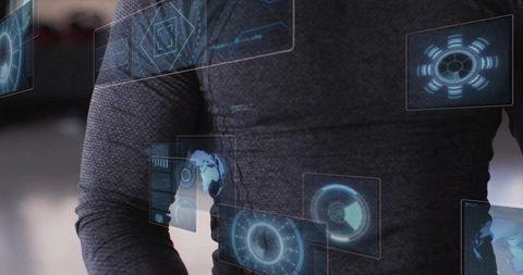 Holographic hud projecting over torso of technician wearing dark long-sleeve top in lab