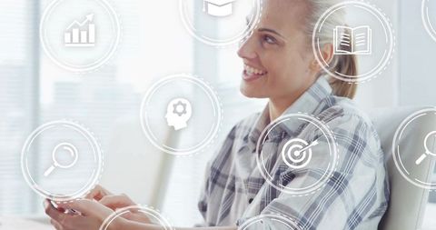 Smiling woman using smartphone with digital learning, business and analytics icons overlay