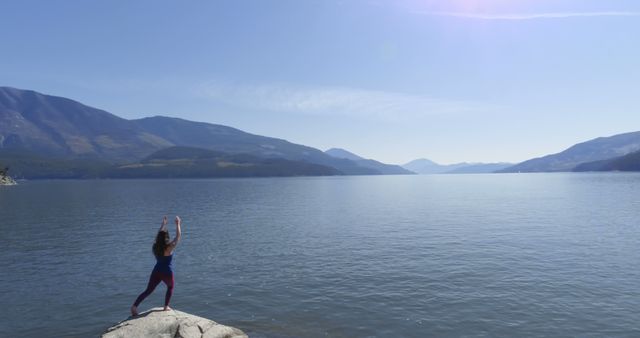 Woman Practicing Yoga by Serene Mountain Lake - Download Free Stock Images Pikwizard.com