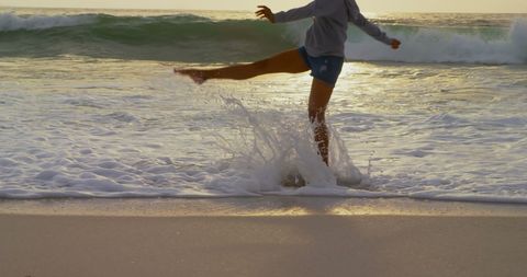 Woman Enjoying Sea Waves Beach Sunset Fun - Download Free Stock Images Pikwizard.com