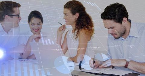 Business Team Analyzing Financial Charts with Digital Overlays