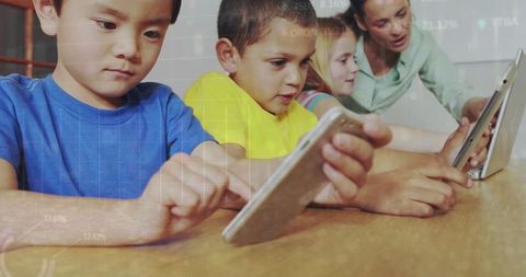 Diverse Schoolchildren and Teacher Engaging in Digital Learning with Tablets