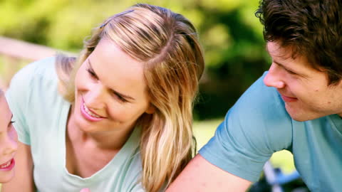 Happy Family Enjoying Time in the Park Together