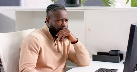 Stressed business professional sorting office tasks