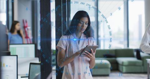 Business Team Engaging in Advanced Data Analysis in Modern Office