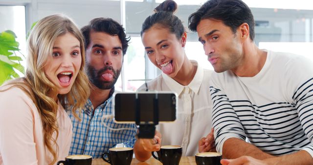 Friends Taking Selfie in Coffee Shop Making Funny Faces - Download Free Stock Images Pikwizard.com