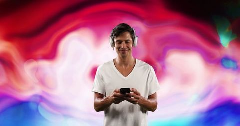 Young man engaging with smartphone technology