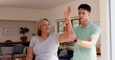 Senior Woman Receives Physiotherapy Assistance at Home - Download Free Stock Images Pikwizard.com