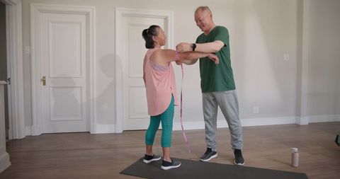 Senior Couple Enjoying Home Workout Routine