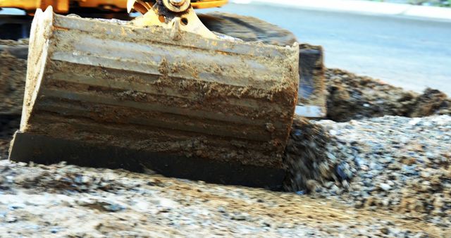 Excavator digging soil at construction site - Download Free Stock Photos Pikwizard.com