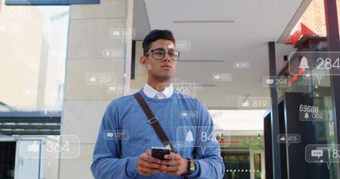 Young man checking mobile with augmented reality social notifications in shopping mall