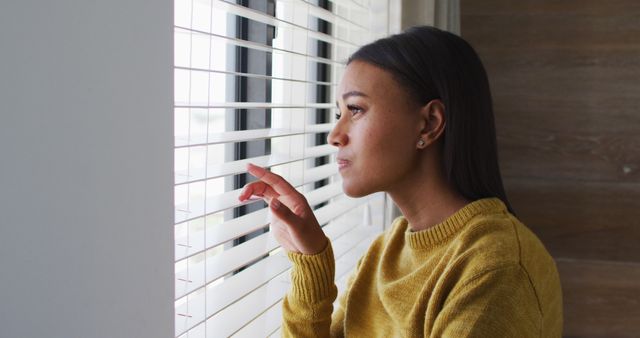 Woman Looking Out Window Through Blinds - Download Free Stock Images Pikwizard.com