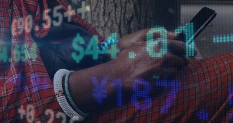 Person in Red Plaid Analyzing Financial Data on Smartphone Outdoors