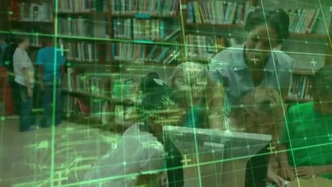 Teacher and Students Engaged in Digital Learning in Library