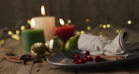 Rustic Thanksgiving Table Setting with Candles and Berries