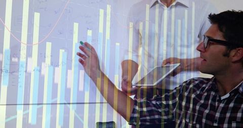 Team collaborating on data visualization with interactive chart