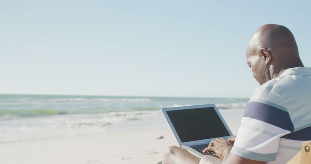 Man Working on Laptop at Beach - Download Free Stock Images Pikwizard.com