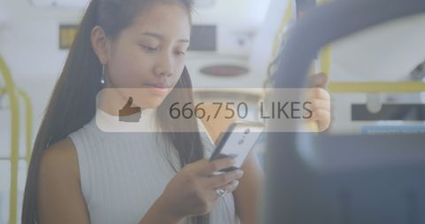 Young Woman Engaged on smartphone in Modern Urban Scene